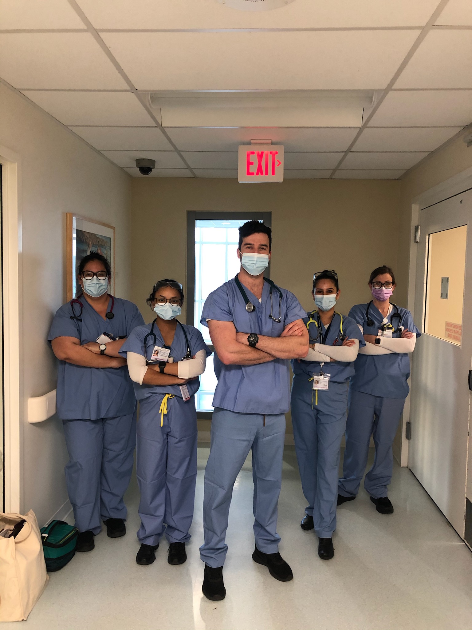 Nursing clinical team in hospital hallway during clinical rotations